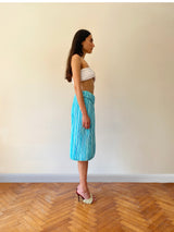 TURQUOISE PLEAT SKIRT